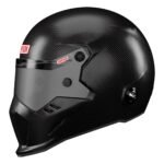 Black carbon fiber motorcycle helmet with a sleek design and tinted visor.